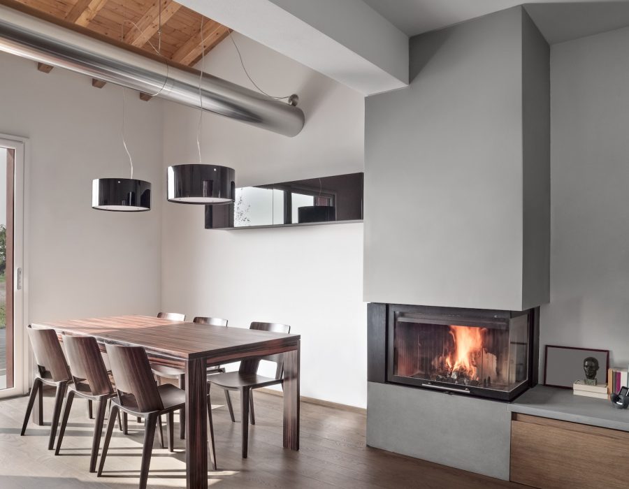 Interiors of a Modern Dining Room with Fireplace